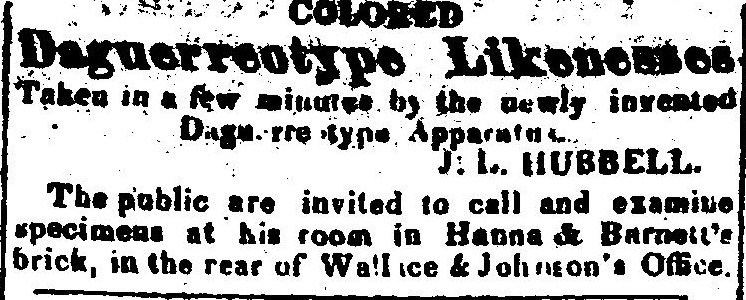 A small newspaper advertisement. The word Colored in small capitals sits over Daguerreotype Likenesses in heavy decorated type, then: Taken in a few minutes by the newly invented Daguerreotype Apparatus, signed J. L. Hubbell. A last line invites the public to examine specimens at his room in Hanna and Barnett's brick, in the rear of Wallace and Johnson's office.